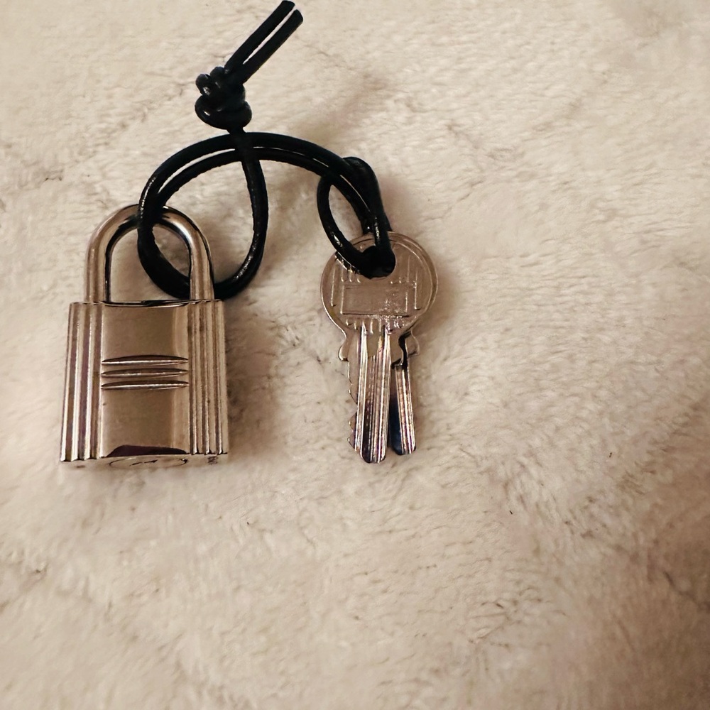 Hermès
Cadena Lock & Key Set-110